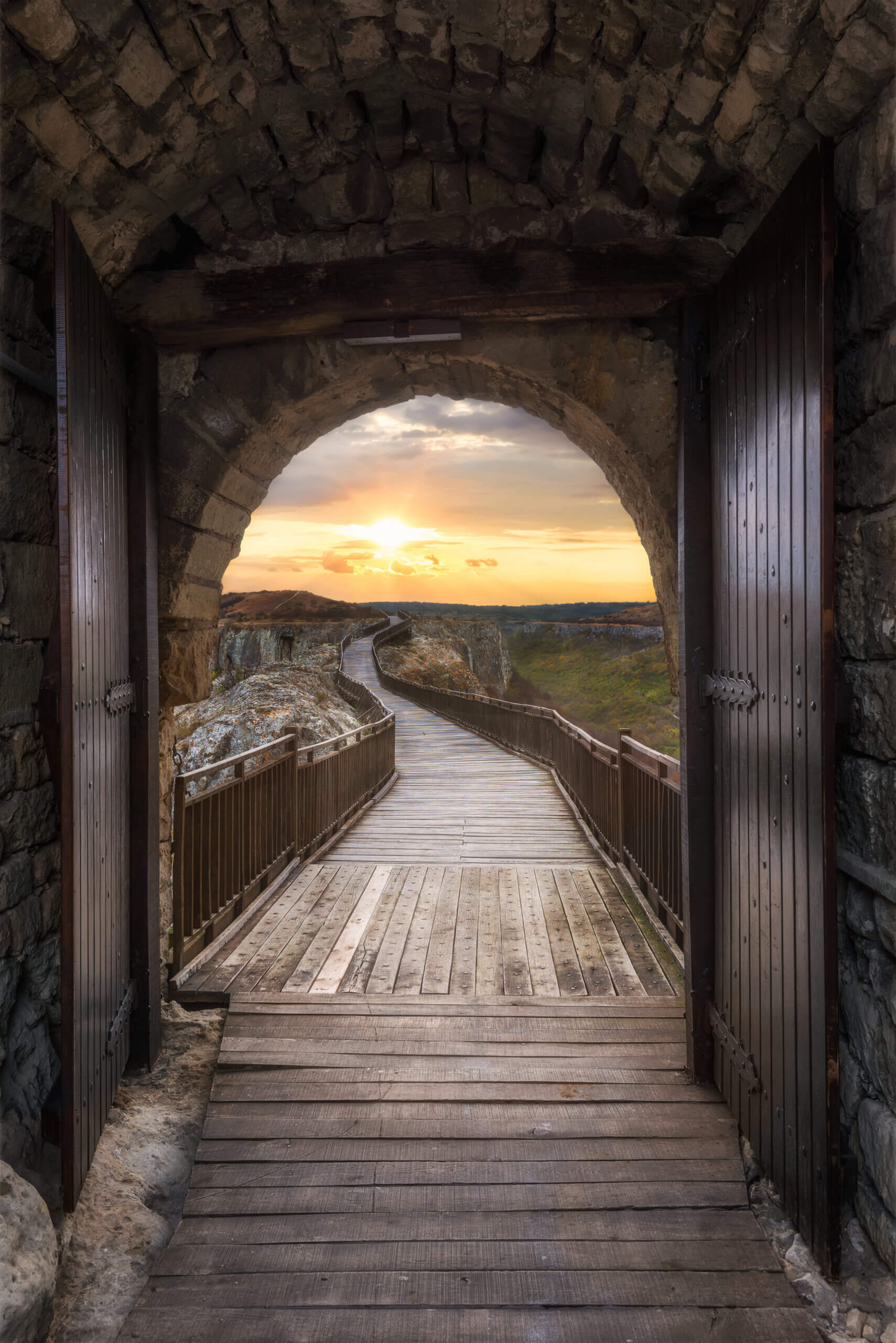 Old fortress at sunset. An amazing sunset view through the main gate of the old medieval fortress Ovech near Provadia, Bulgaria